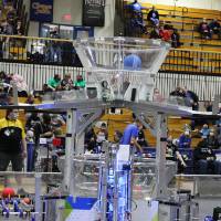 Robots shoot balls during the autonomous period